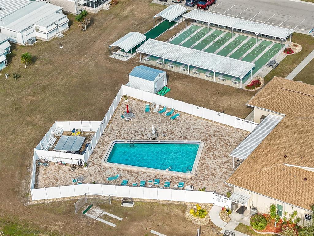 5619 Bayshore Road, Unit 417 Palmetto, FL 34221 - Photo 30 of 36 an aerial view of a house with a yard