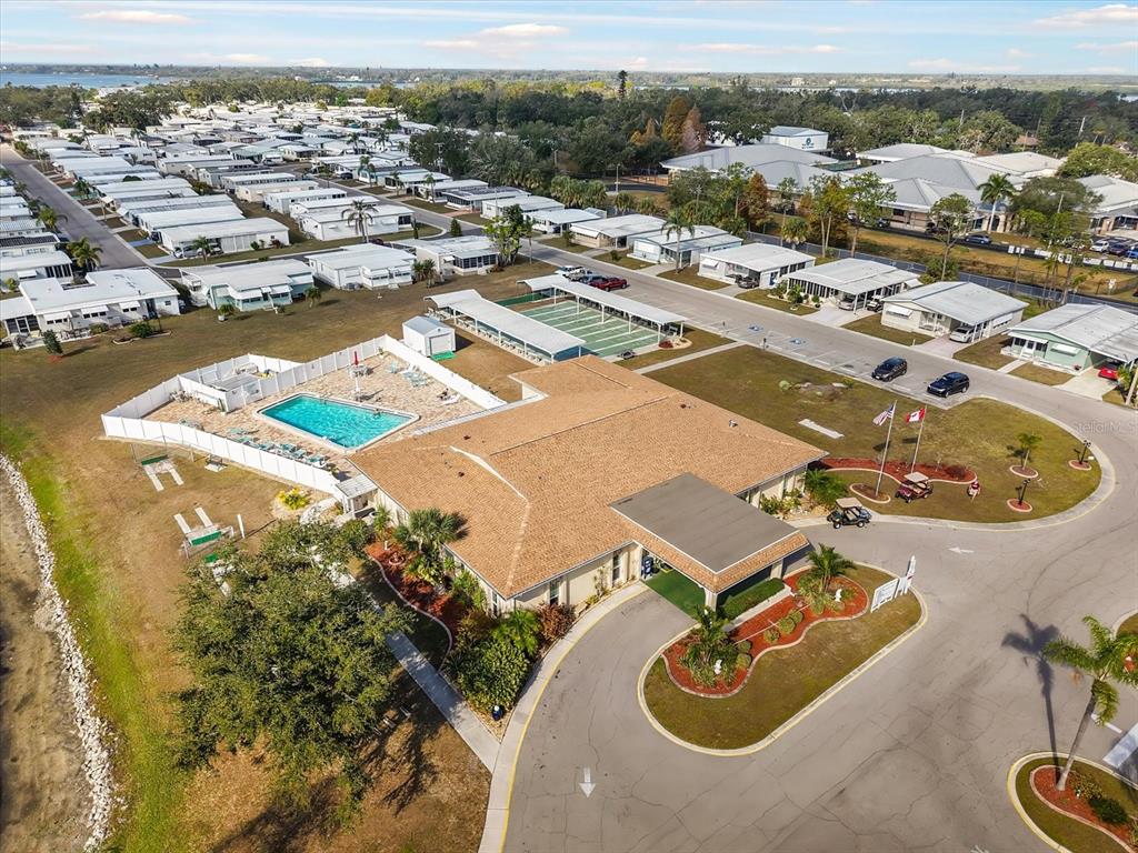 5619 Bayshore Road, Unit 417 Palmetto, FL 34221 - Photo 31 of 36 an aerial view of a swimming pool and mountain view