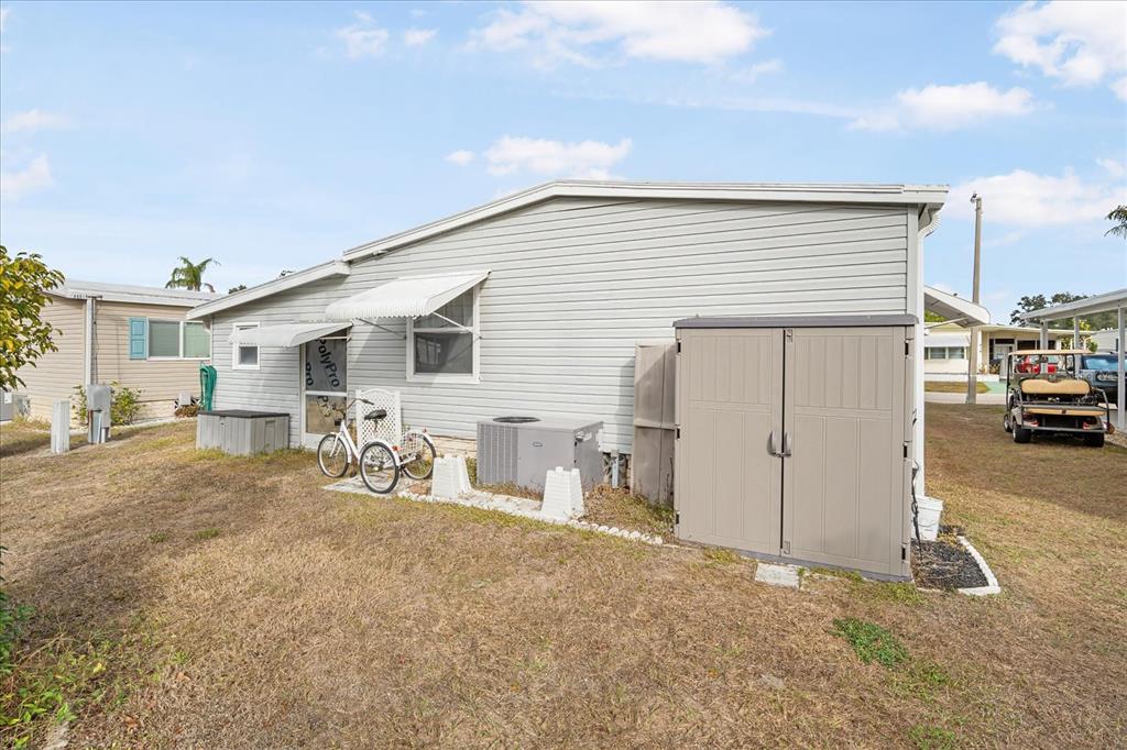 5619 Bayshore Road, Unit 417 Palmetto, FL 34221 - Photo 5 of 36 a view of a house with a patio