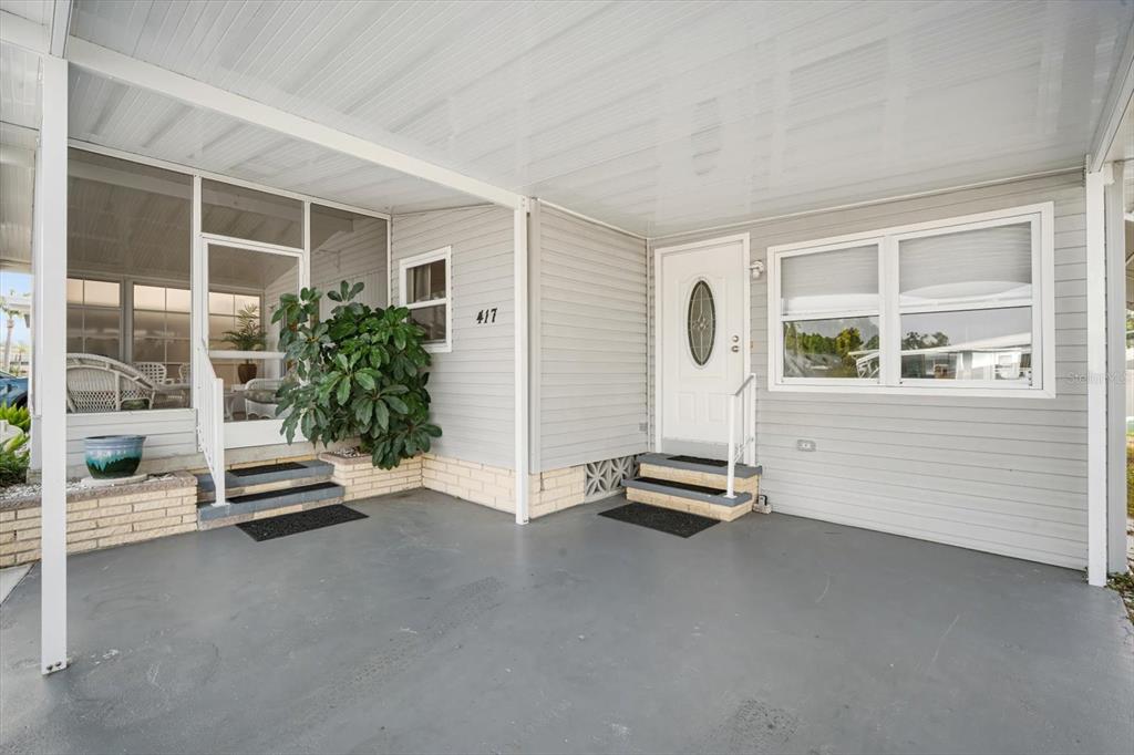 5619 Bayshore Road, Unit 417 Palmetto, FL 34221 - Photo 7 of 36 a room with gym equipment and a large window