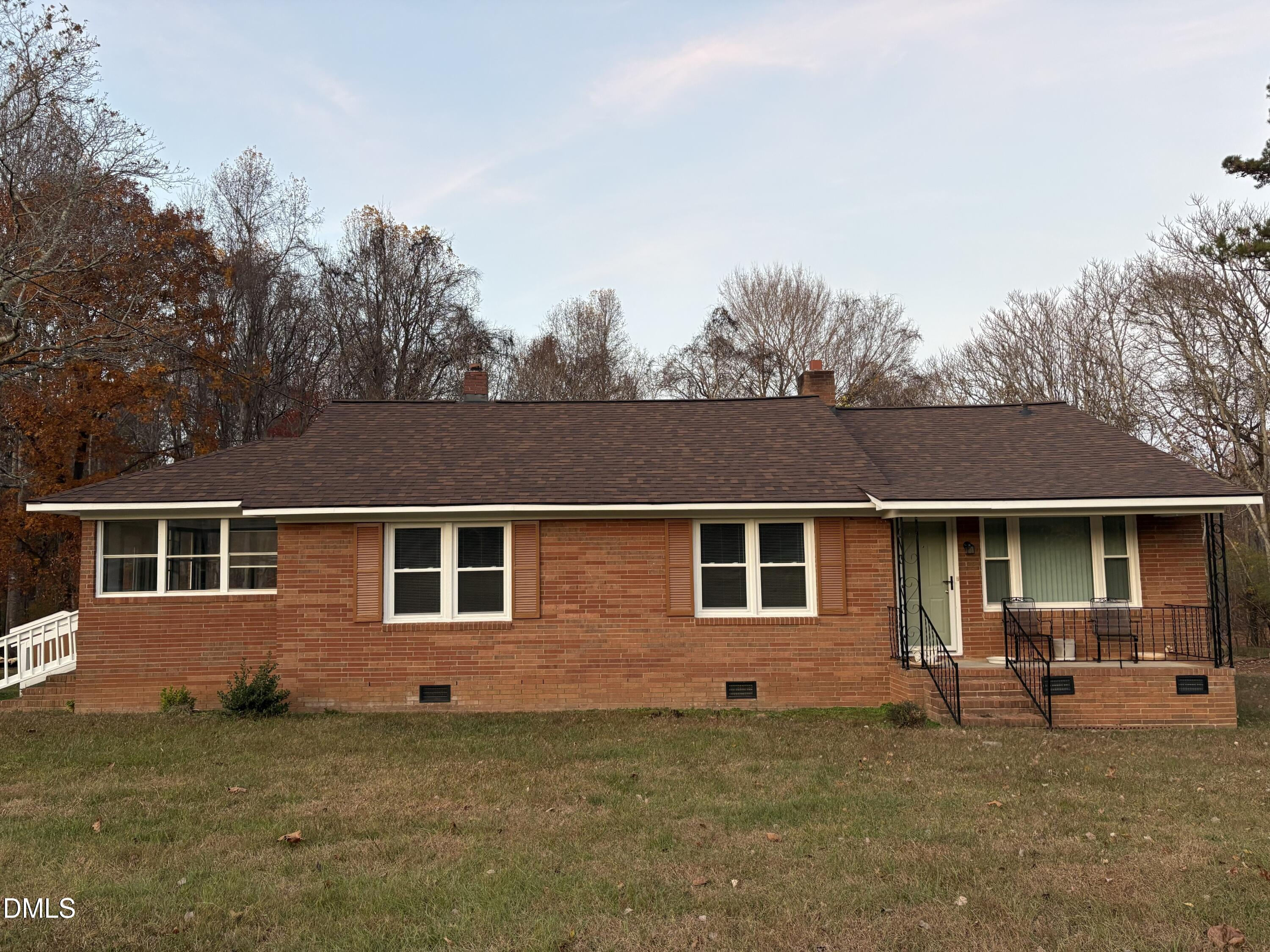 6803 High Rock Road Efland, NC 27243 - Photo 1 of 11 a view of outdoor space yard and front view of a house