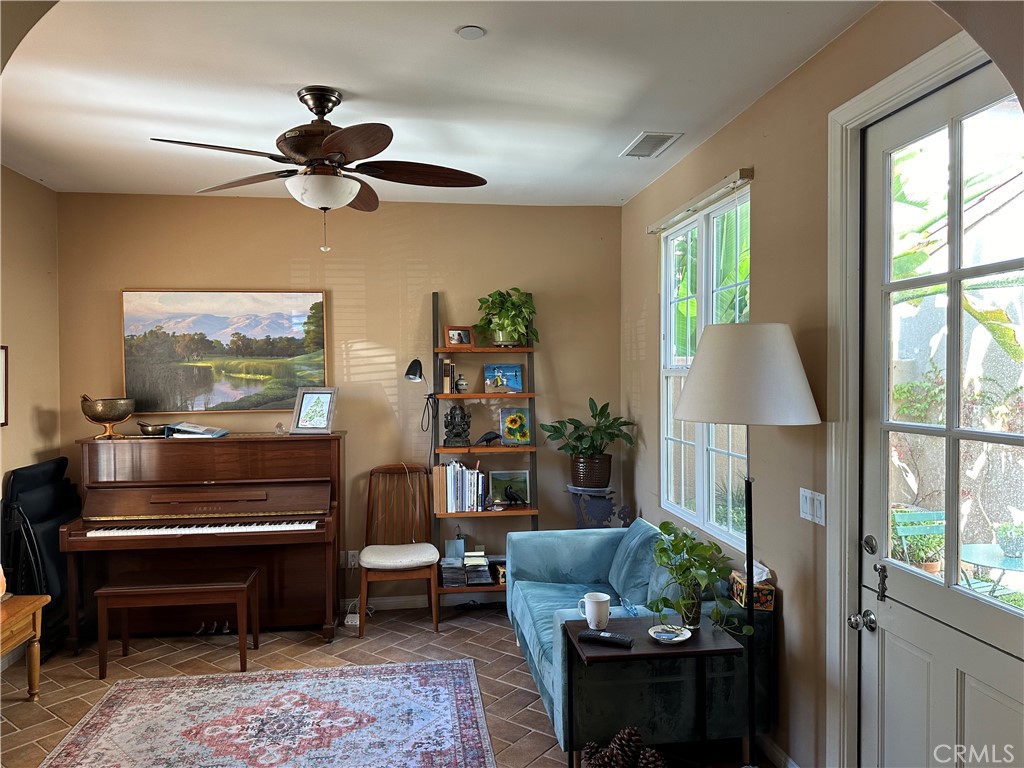 139 Canyoncrest Irvine, CA 92603 - Photo 3 of 5 a living room with furniture and a window