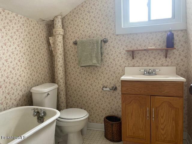 15 State Line Road West Stockbridge, MA 01266 - Photo 13 of 16 a bathroom with a sink a toilet and a bathtub