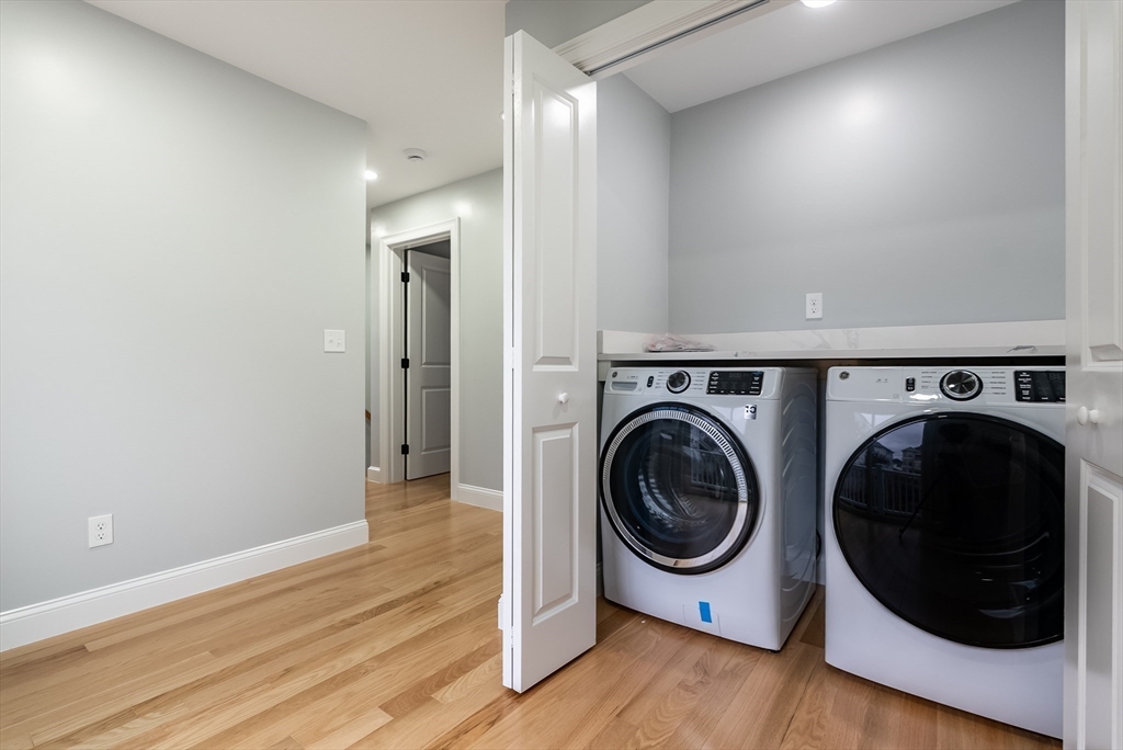 219 Earle Street, Unit 3 Fall River, MA 02723 - Photo 13 of 27 a view of a hallway with washer and dryer