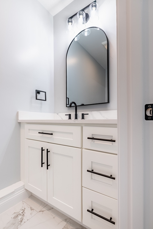 219 Earle Street, Unit 3 Fall River, MA 02723 - Photo 9 of 27 a bathroom with a sink and a mirror