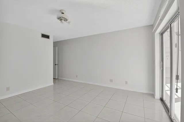 an aerial view of a house with a swimming pool yard and outdoor seating
