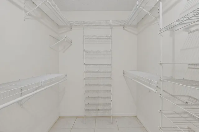 an aerial view of a house with a swimming pool yard and outdoor seating