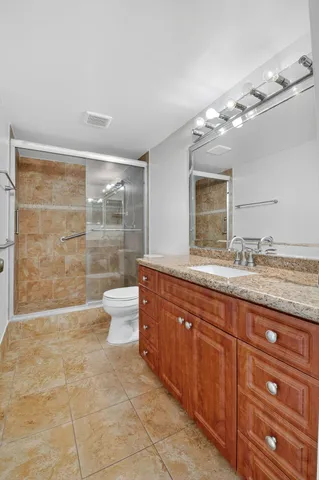 an aerial view of house with yard swimming pool and outdoor seating