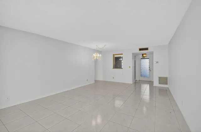 a bathroom with a sink a vanity and a shower
