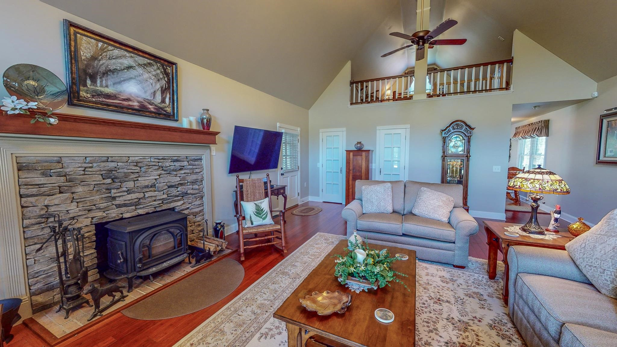 319 Huff Road Roxboro, NC 27574 - Photo 5 of 99 a living room with furniture a rug and a fireplace