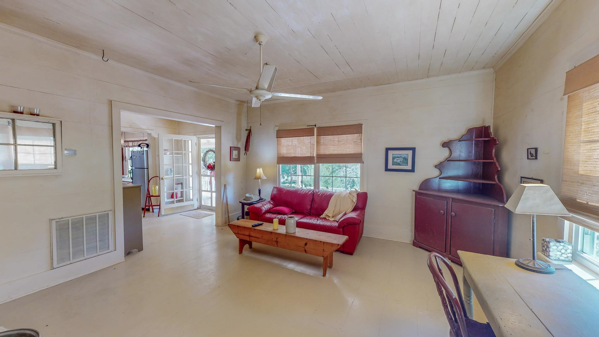 319 Huff Road Roxboro, NC 27574 - Photo 78 of 99 a living room with furniture and a flat screen tv