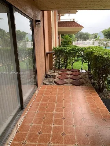 a view of a backyard with garden