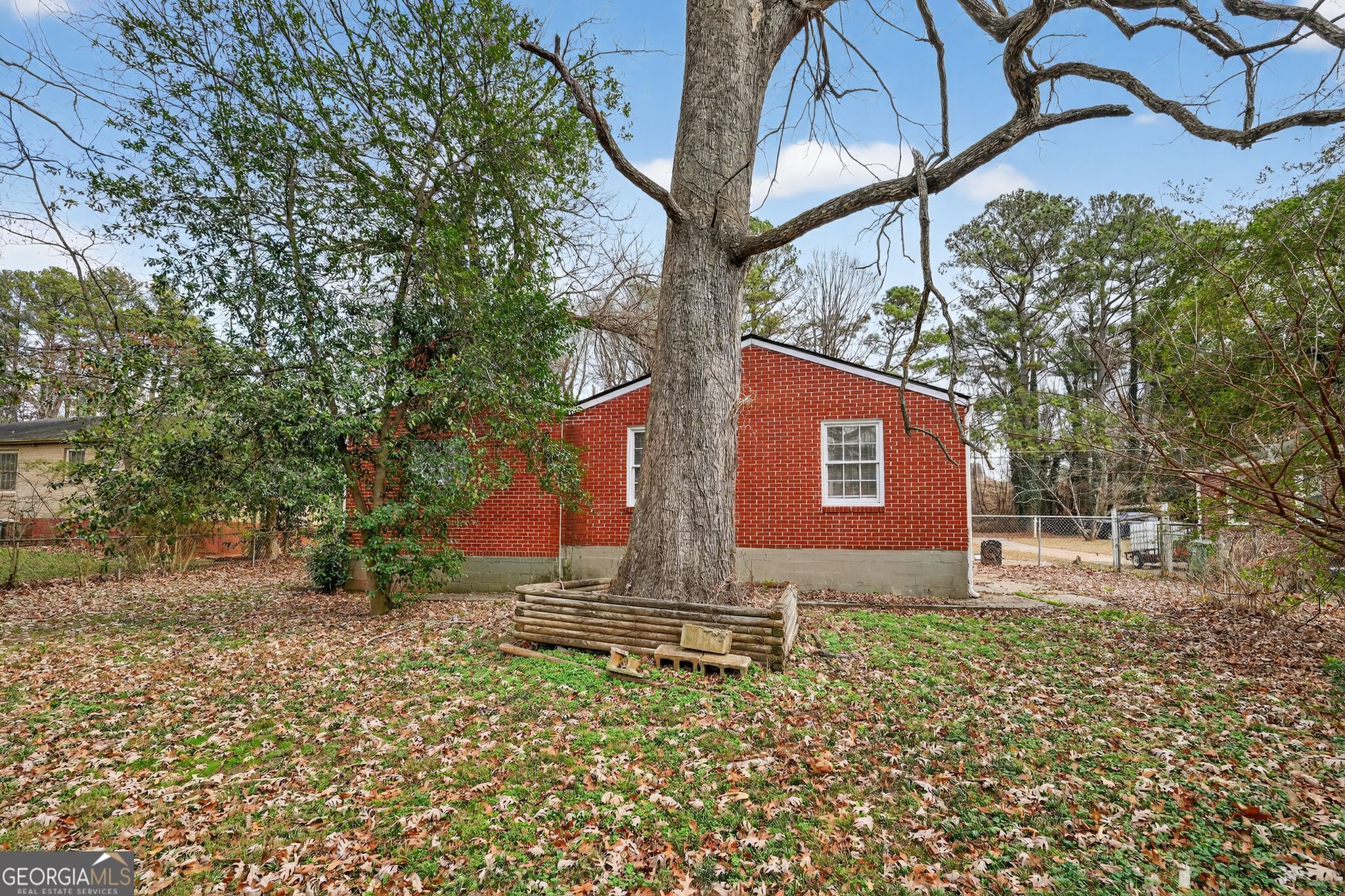 1883 Clarke Lane Decatur, GA 30035 - Photo 2 of 32 a view of a house with a yard