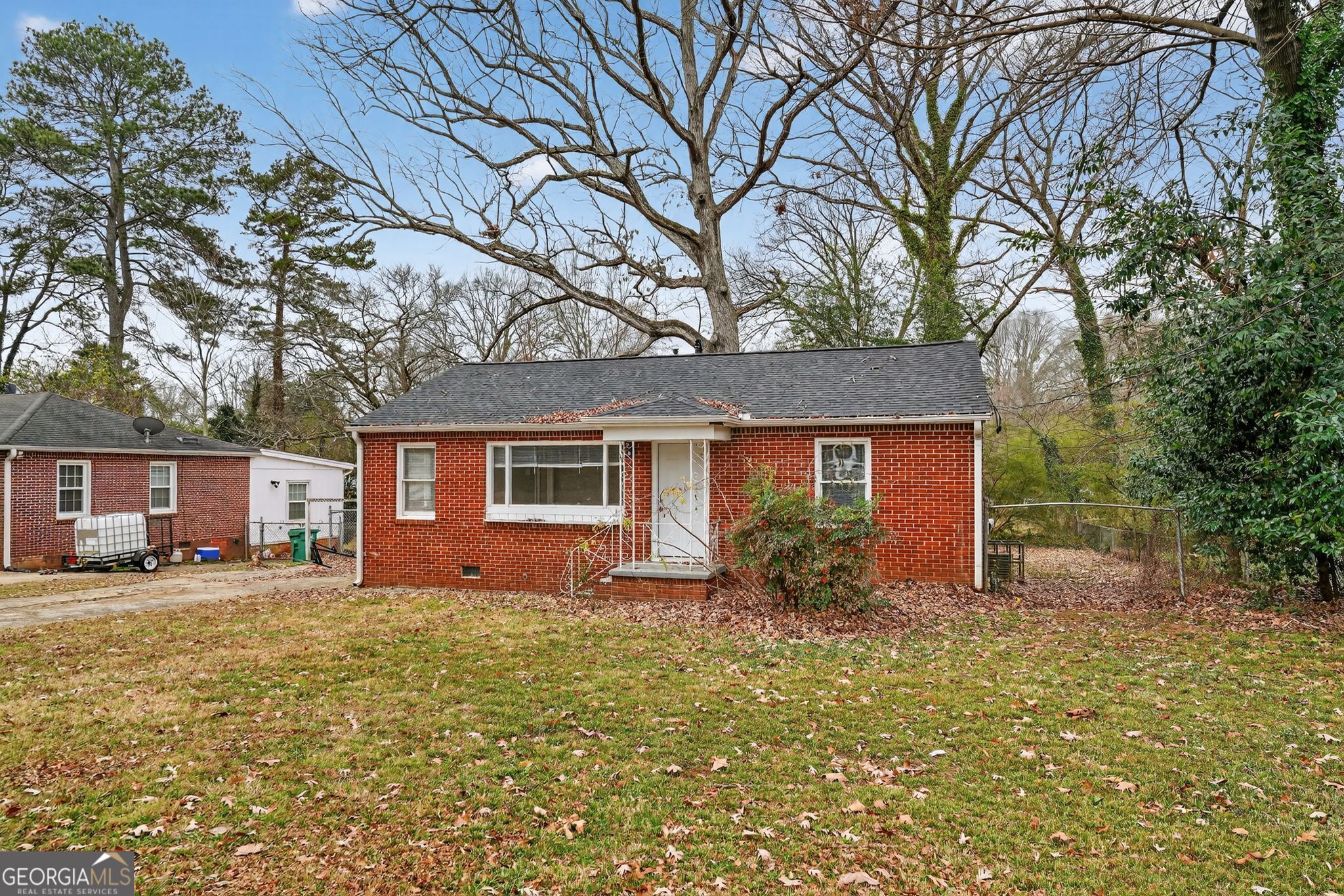 1883 Clarke Lane Decatur, GA 30035 - Photo 32 of 32 front view of a house with a yard