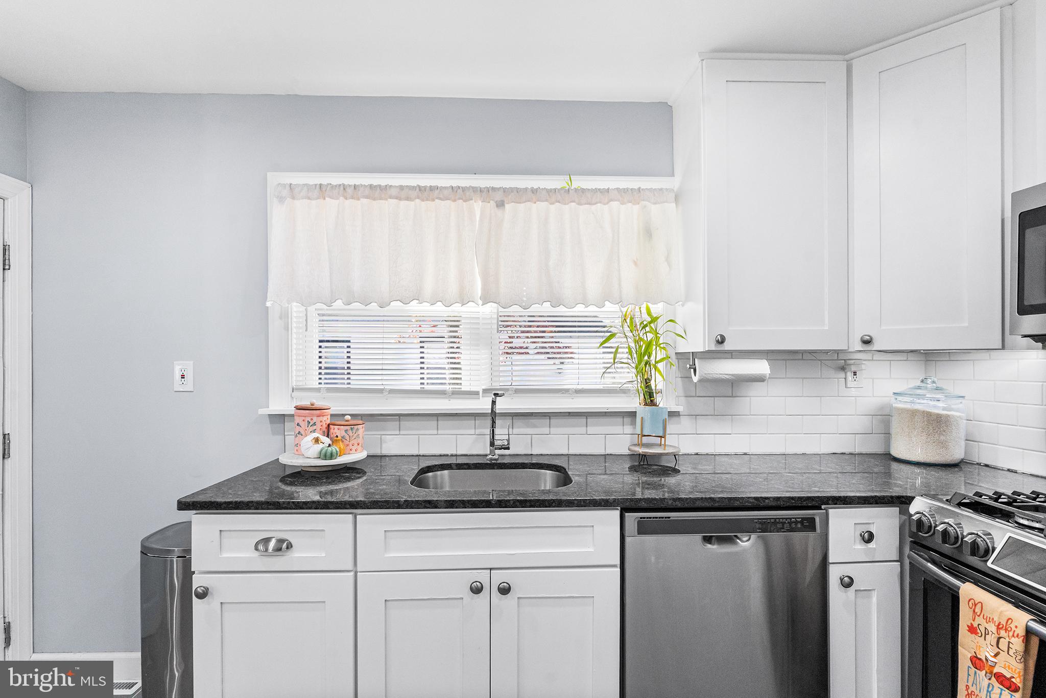 14 Nicholson Road Mount Ephraim, NJ 08059 - Photo 16 of 38 Bright and airy kitchen with modern finishes.