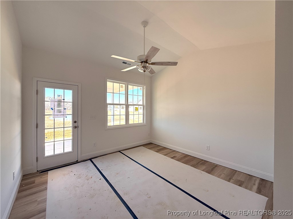111 Ironbark Drive Raeford, NC 28376 - Photo 11 of 11 a view of an empty room with a window