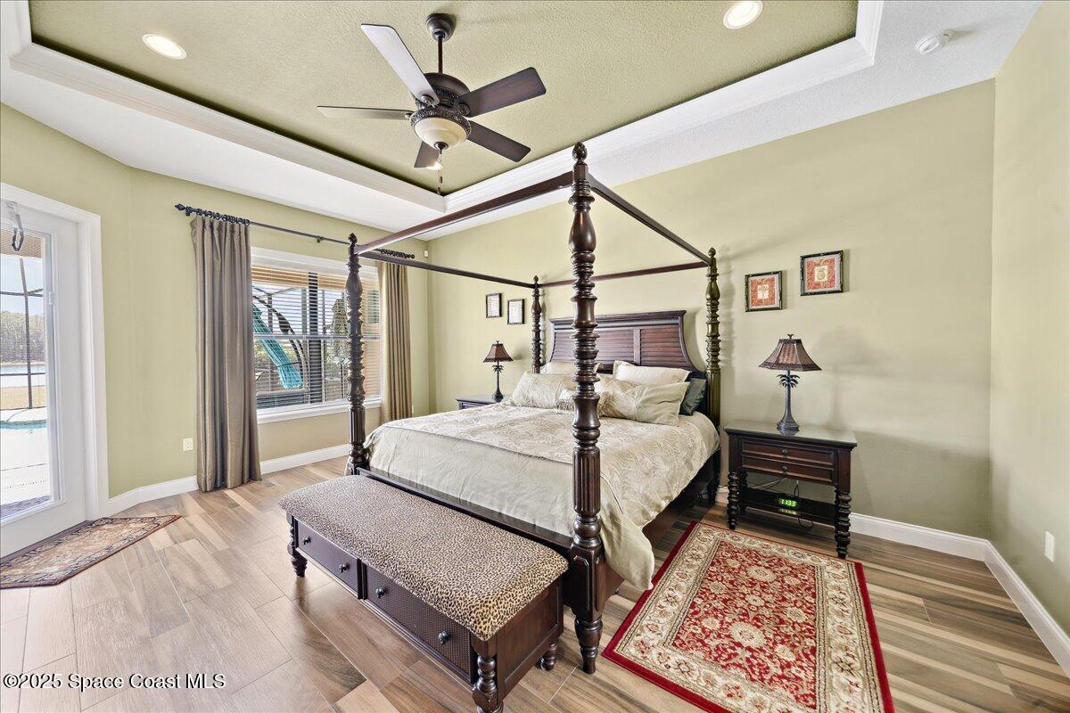 4464 Preservation Circle Melbourne, FL 32934 - Photo 20 of 65 a bedroom with a bed and a window