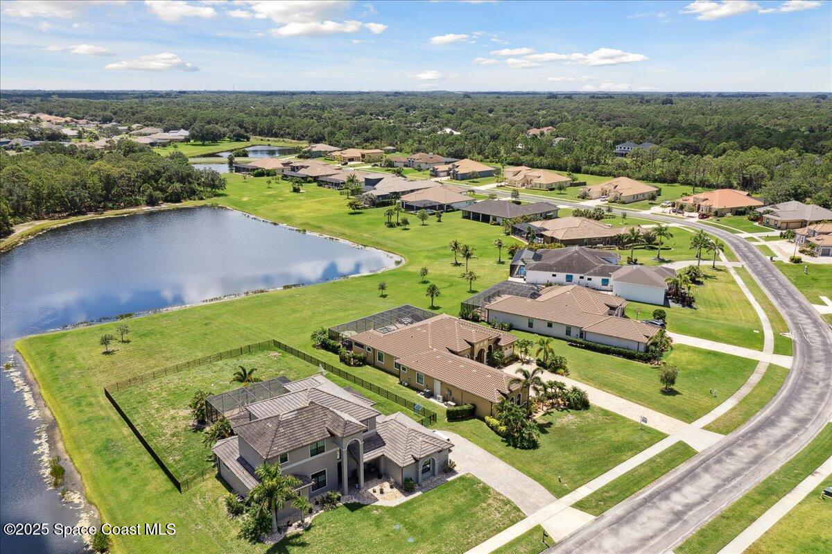 4464 Preservation Circle Melbourne, FL 32934 - Photo 56 of 65 an aerial view of residential houses with outdoor space