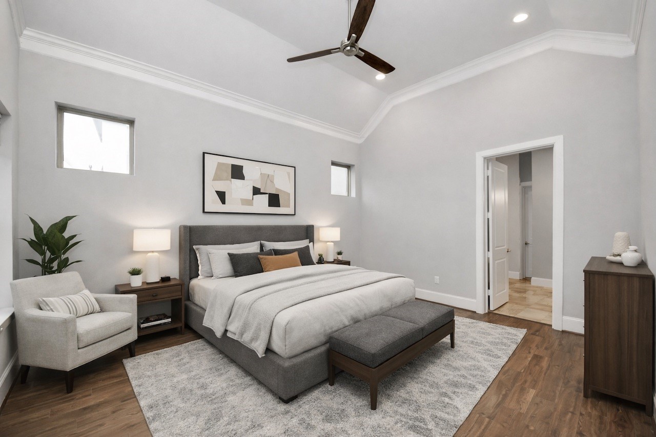 8609 Concord Trace Houston, TX 77055 - Photo 25 of 50 a bedroom with a large bed couch and a window