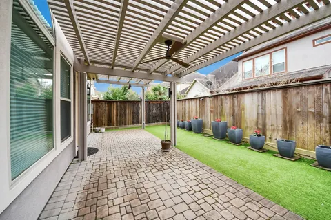 a view of a backyard of the house