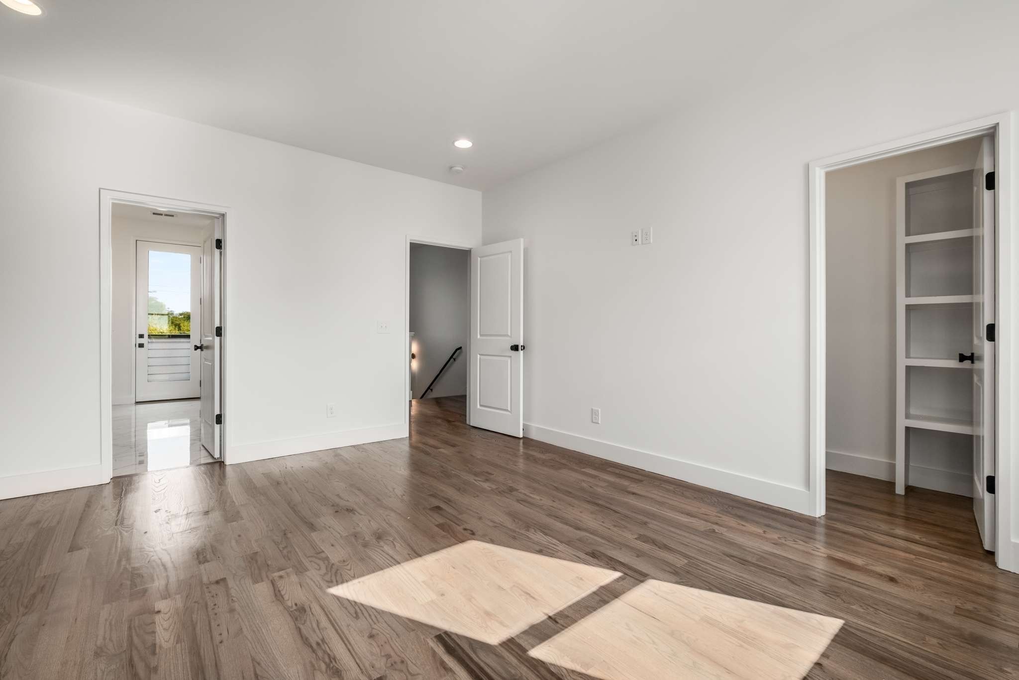 1806 Lischey Avenue, Unit 3 Nashville, TN 37207 - Photo 11 of 25 wooden floor in an empty room with a window