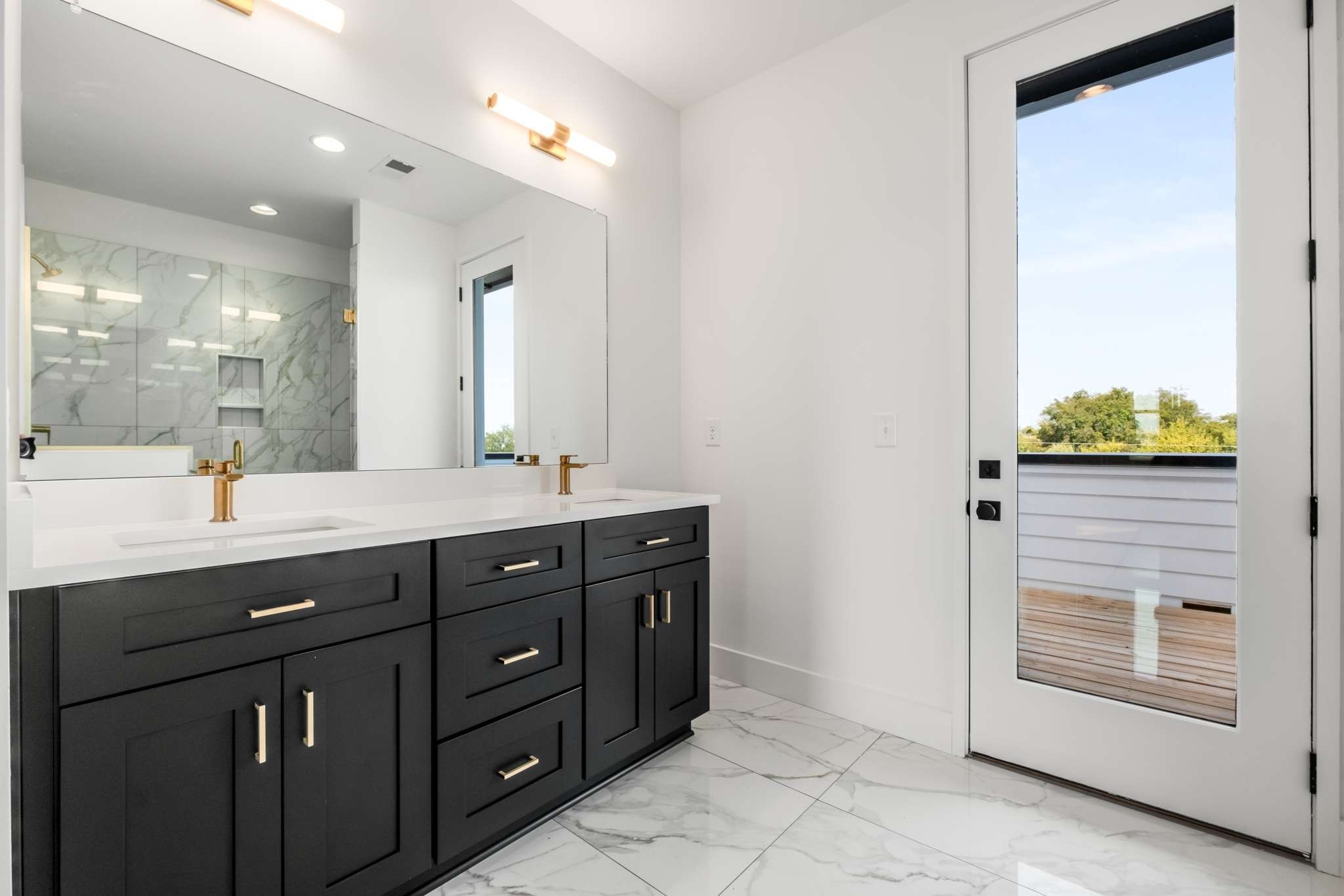 1806 Lischey Avenue, Unit 3 Nashville, TN 37207 - Photo 15 of 25 a bathroom with a granite countertop sink a mirror and a