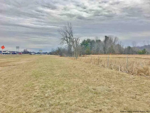 a view of a lake with beach