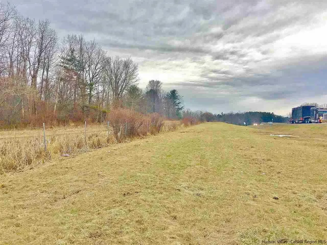 a view of a back yard of the house