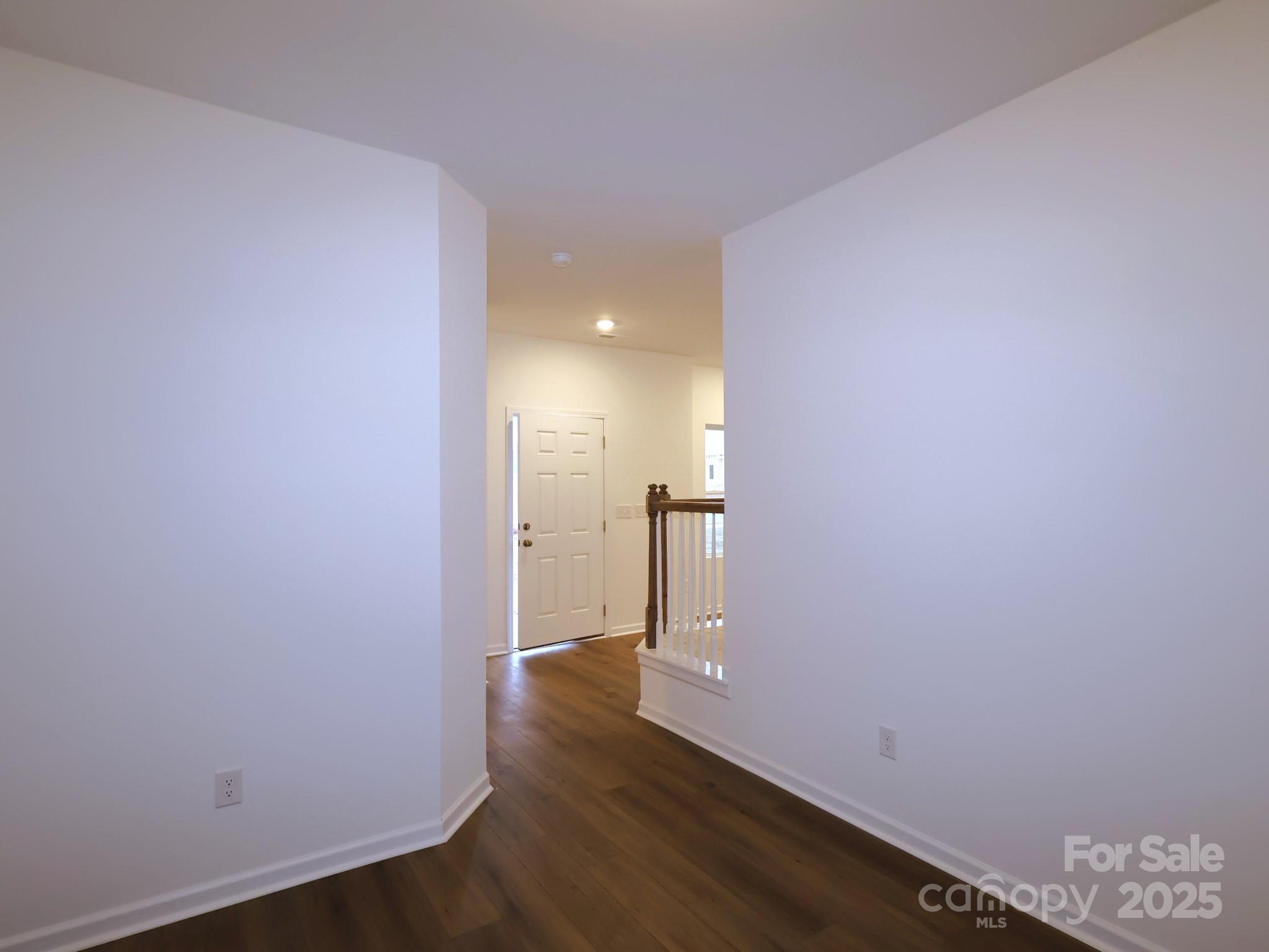 776 Kitfox Drive Northwest Concord, NC 28027 - Photo 3 of 12 a view of a room with wooden floor