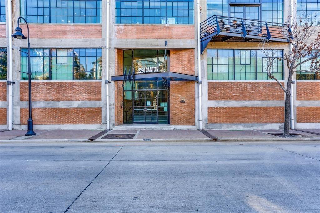 2220 Canton Street, Unit 406 Dallas, TX 75201 - Photo 16 of 22 a view of a brick building with a street