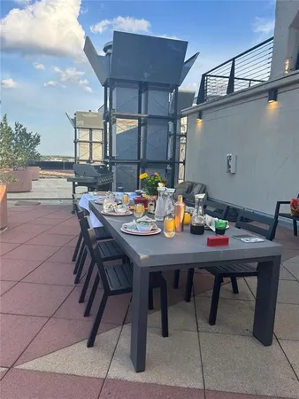 a kitchen with a sink a stove and cabinets
