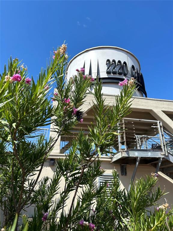 2220 Canton Street, Unit 406 Dallas, TX 75201 - Photo 21 of 22 a view of a swimming pool with a yard