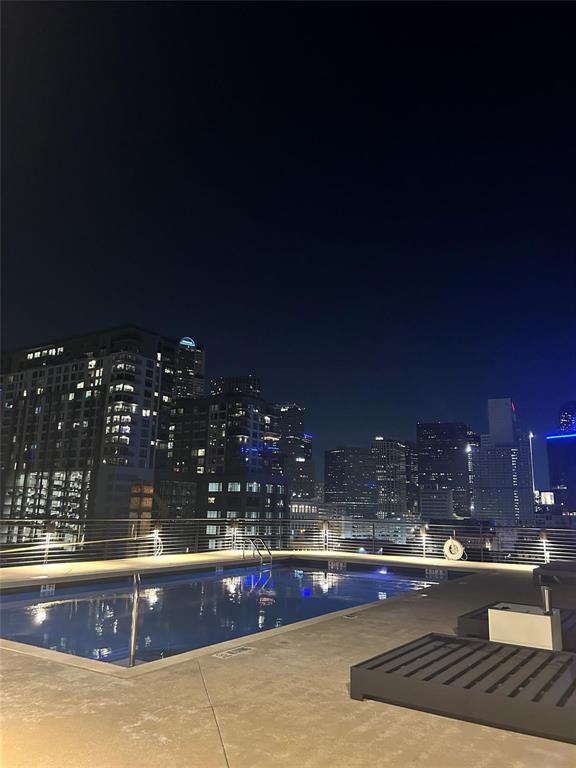 2220 Canton Street, Unit 406 Dallas, TX 75201 - Photo 22 of 22 a view of swimming pool and outdoor seating