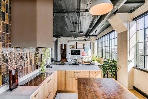2220 Canton Street, Unit 406 Dallas, TX 75201 - Photo 7 of 22 a view of living room kitchen and entryway