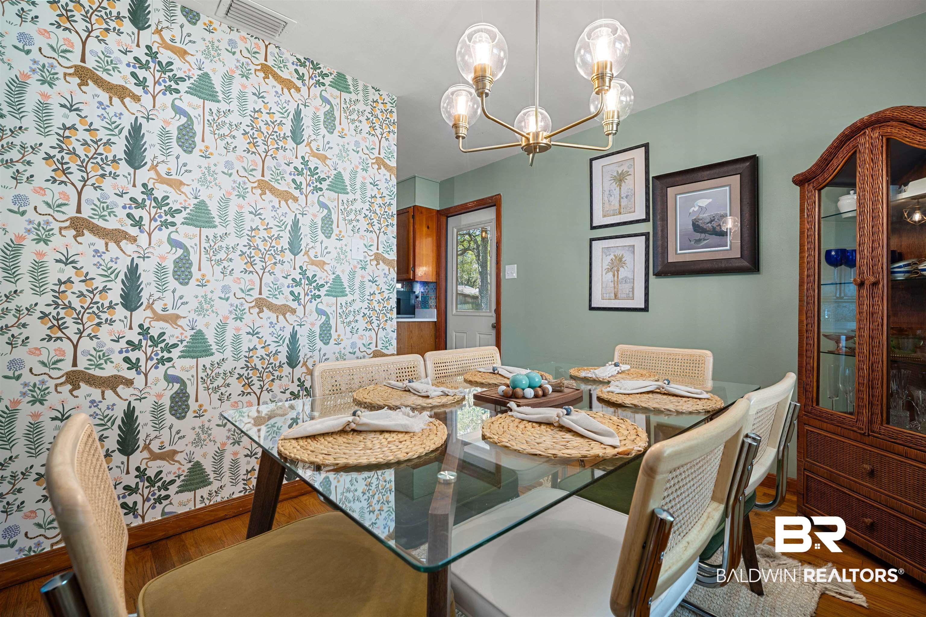 672 Tarawa Drive Mobile, AL 36609 - Photo 15 of 26 Dining area featuring a chandelier and wood finished floors