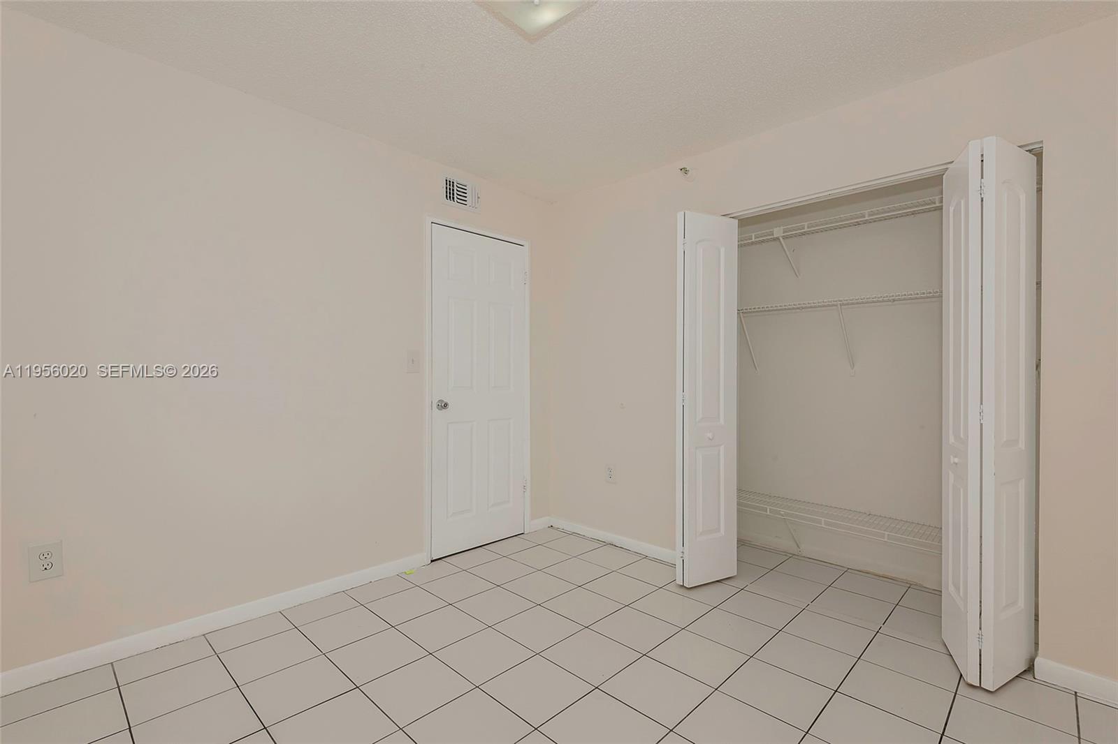 7785 West 30th Court, Unit F104 Hialeah, FL 33018 - Photo 17 of 17 a view of an empty room