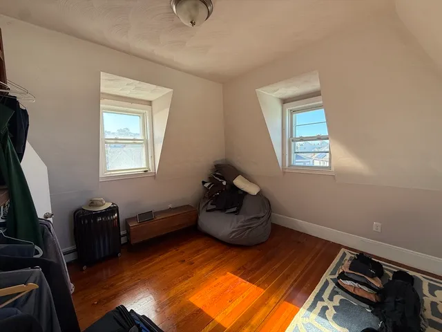 a room with toys and a wooden floor