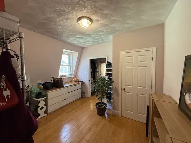 a room with furniture and a window