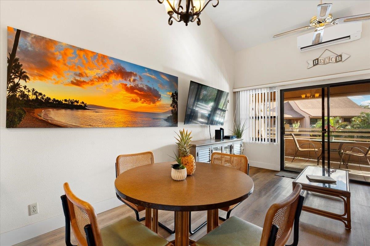 679 South Kihei Road, Unit D203 Kihei, HI 96753 - Photo 27 of 46 a view of a dining room with furniture and window