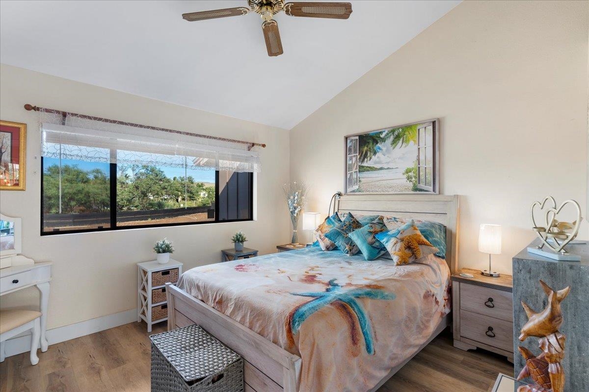 679 South Kihei Road, Unit D203 Kihei, HI 96753 - Photo 37 of 46 a bedroom with a bed and window