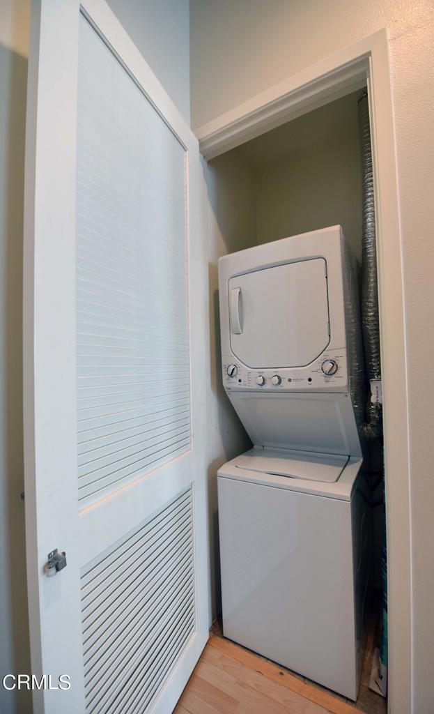 175 South Lake Avenue, Unit 406 Pasadena, CA 91101 - Photo 11 of 12 a utility room with dryer and washer