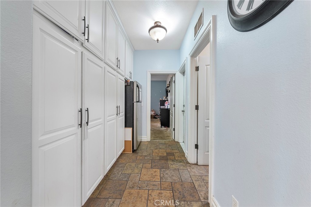 7172 Jargon Road Hesperia, CA 92344 - Photo 29 of 75 a view of a hallway with a white walls