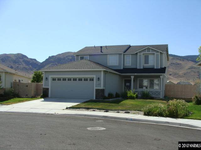 10192 Cascade Falls Court Reno, NV 89521 - Photo 1 of 1 a view of a house with a yard and a large parking space