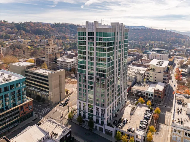 a view of a city with tall buildings