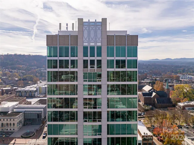 a view of a city with tall buildings