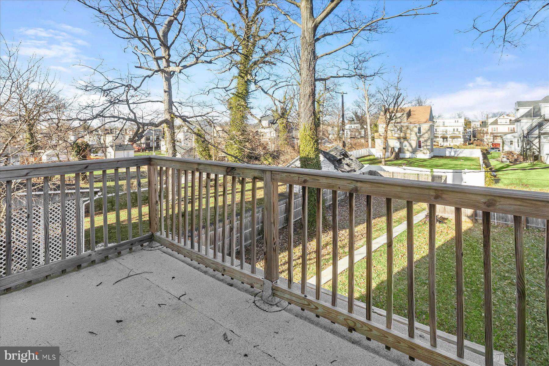 4006 Springdale Avenue Baltimore, MD 21207 - Photo 13 of 40 a view of outdoor space with wooden fence