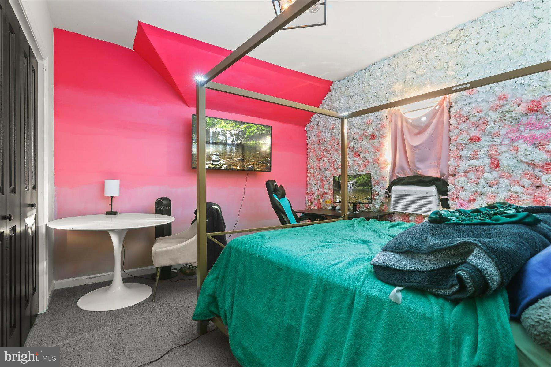 4006 Springdale Avenue Baltimore, MD 21207 - Photo 17 of 40 a bed room with a bed and a chair