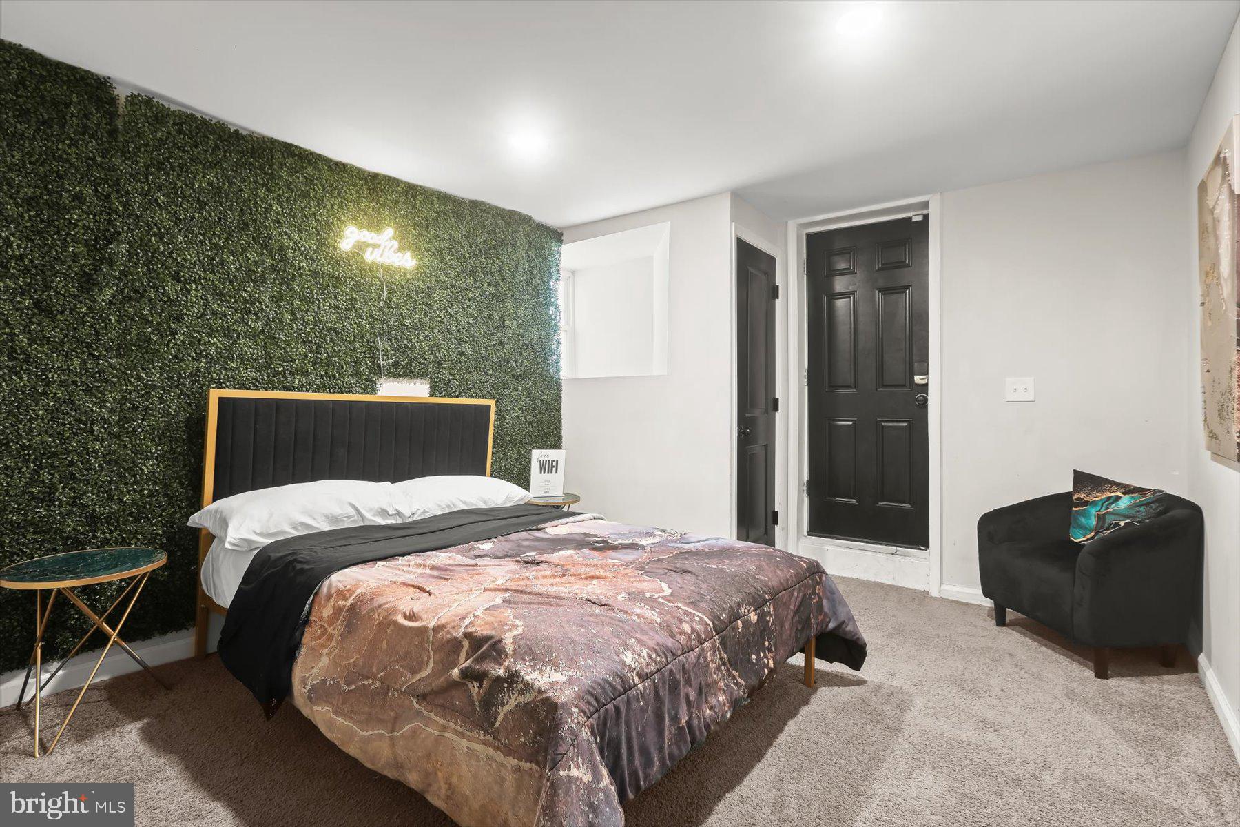 4006 Springdale Avenue Baltimore, MD 21207 - Photo 27 of 40 a bedroom with a bed and dresser