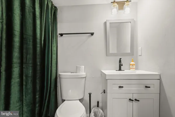 a view of backyard with cabin