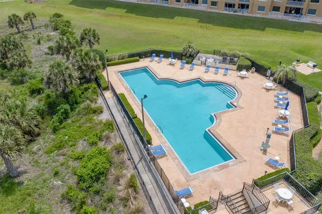 a view of a lake with a building in the background